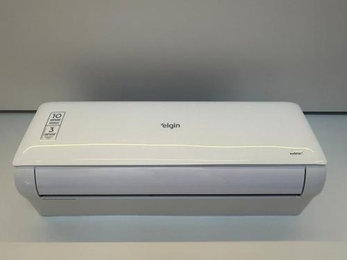 a white device is sitting on a table at Garden on Blue Studio - GRU 303 in Guarulhos