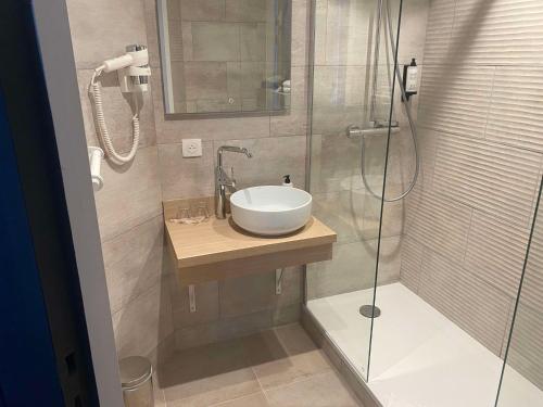 Ein Badezimmer in der Unterkunft Best Western Le Moulin de Ducey