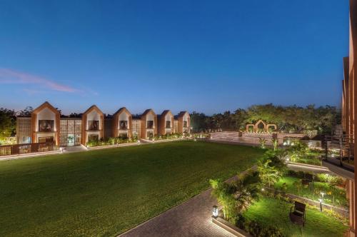 an aerial view of a large lawn at night at Radisson Resort & Spa Kandla in Gandhidham