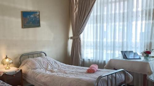 Llit o llits en una habitació de Estancia corta