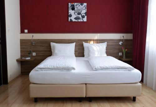 Postel nebo postele na pokoji v ubytování HOTEL MARIA