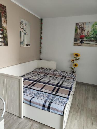 a bed in a white room with a bed sidx sidx sidx at La casa di marcos in Costa Calma