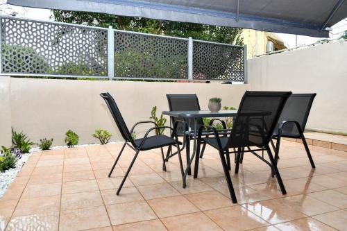 Patio nebo venkovní prostory v ubytování Secret Yard Luxury Apartment