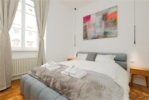 Ένα ή περισσότερα κρεβάτια σε δωμάτιο στο Jonathan Luxury Apartment Trieste Station