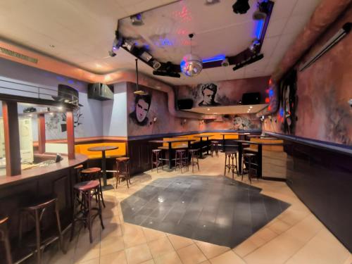 a bar with tables and chairs in a restaurant at Smart Resorts B&B 2 BB2 326 in Winterberg