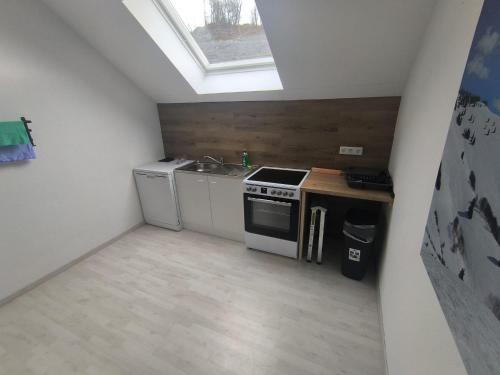 Kuchyň nebo kuchyňský kout v ubytování Smart Resorts B&B 2 BB2 321