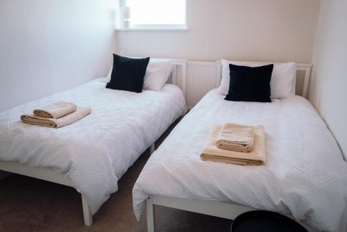 Katil atau katil-katil dalam bilik di Bradley's Hideaway With Private Garden