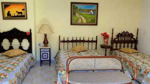 Katil atau katil-katil dalam bilik di Quarto Seu Aconchego