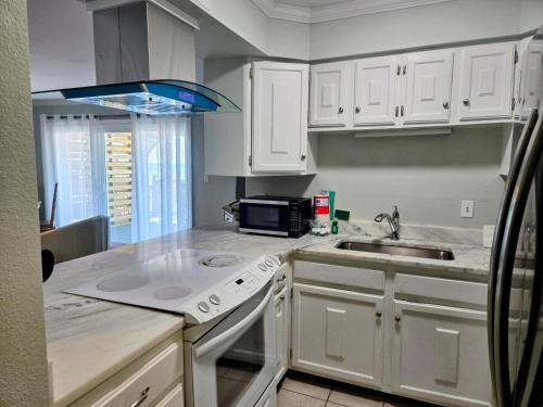 Una cocina o zona de cocina en Boardwalk#3