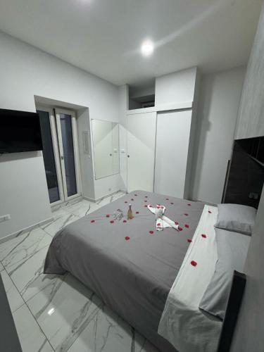 Ένα ή περισσότερα κρεβάτια σε δωμάτιο στο Home Miky