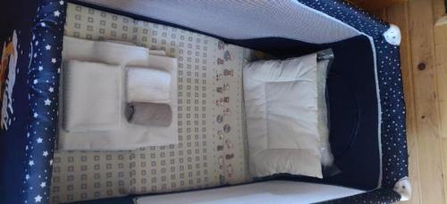 a toy room with a bed with stars on the wall at Lodge House Tara in Kolašin