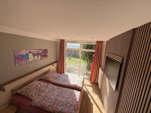 Postel nebo postele na pokoji v ubytování Ferienhaus-Maxe-Wohnung-Hannah