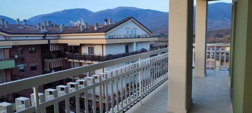 a balcony of a building with mountains in the background at Molise Rigenera in Isernia