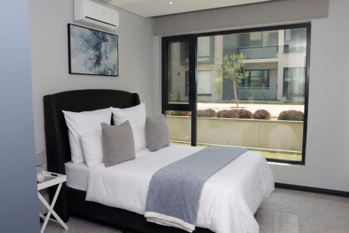 Katil atau katil-katil dalam bilik di Cityscape J3, 2 Bedrooms, 2 Queen Beds
