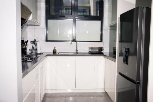 Dapur atau dapur kecil di Cityscape J3, 2 Bedrooms, 2 Queen Beds