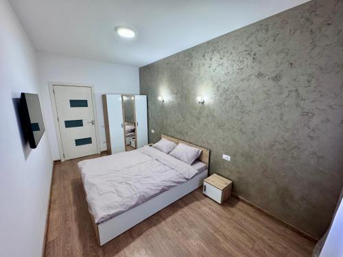 Postel nebo postele na pokoji v ubytování Apartament