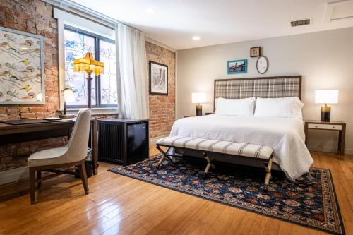 Postel nebo postele na pokoji v ubytování Hotel Maxwell Anderson