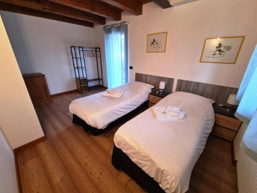 Postel nebo postele na pokoji v ubytování La Casa di Adele