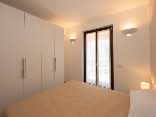 Ένα ή περισσότερα κρεβάτια σε δωμάτιο στο Apartment Anna by Interhome