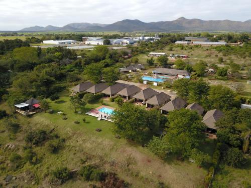 an aerial view of a village with houses at Kruger View Chalets in Malelane