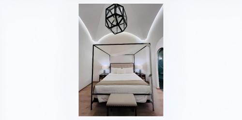 Casa Haus Hotel Puebla Centro Históricoにあるベッド