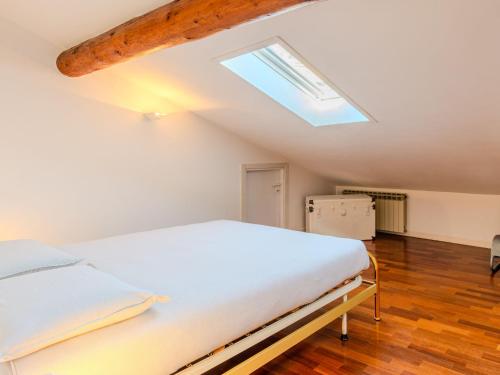 Postel nebo postele na pokoji v ubytování Apartment Ceresa by Interhome