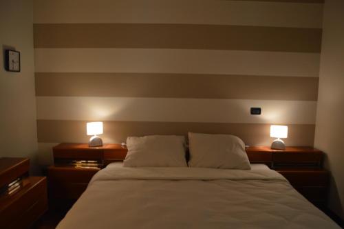 Ένα ή περισσότερα κρεβάτια σε δωμάτιο στο Casa Emma