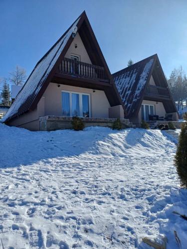a house in the snow with snow at Zlatar Eyes in Nova Varoš