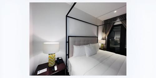 Casa Haus Hotel Puebla Centro Históricoにあるベッド