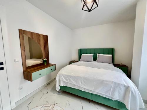 Postel nebo postele na pokoji v ubytování Ilidza Apartments - PEJTON RESIDENCE - Free Parking