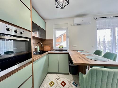 Kuchyň nebo kuchyňský kout v ubytování Ilidza Apartments - PEJTON RESIDENCE - Free Parking