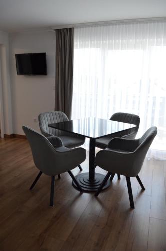 TV a/nebo společenská místnost v ubytování ApartHotel
