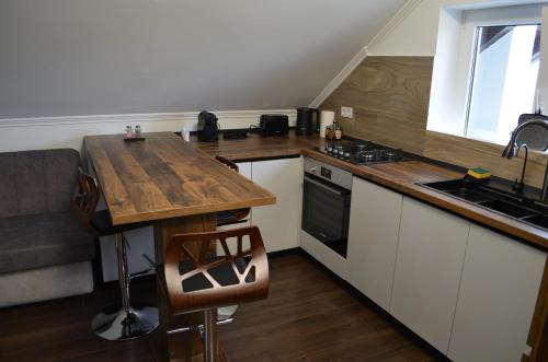 Kuchyň nebo kuchyňský kout v ubytování ApartHotel