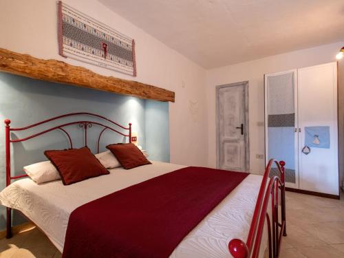 a bedroom with a large bed in a room at Holiday Home Francesca by Interhome in Vignola Mare