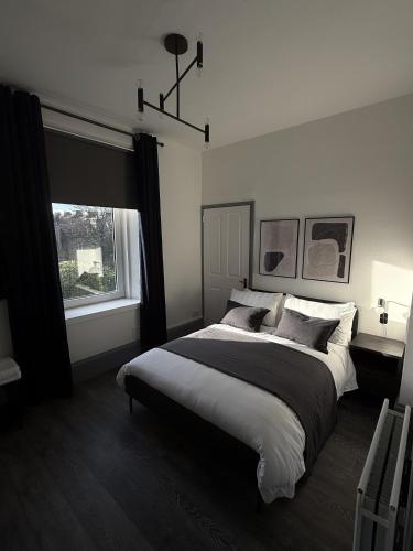 Katil atau katil-katil dalam bilik di Sunnyside Apartment