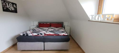 En eller flere senge i et værelse på Ferienwohnung Mila