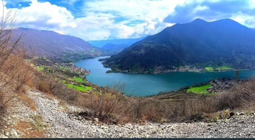 a view of a lake in front of a mountain at Casa Vacanza SK in Bianzano