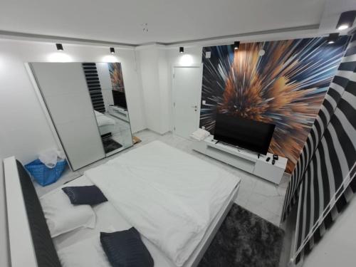 Postel nebo postele na pokoji v ubytování Apartman Tiha Noc