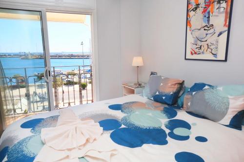 Ένα ή περισσότερα κρεβάτια σε δωμάτιο στο Apartamentos La Torre