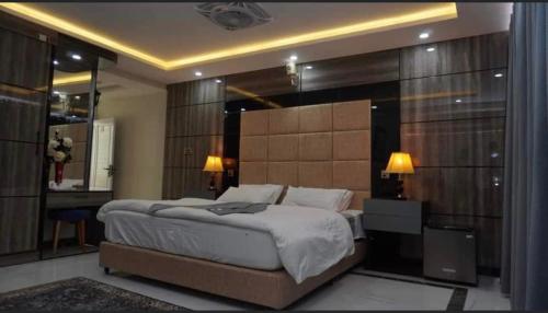 Кровать или кровати в номере Sapphire Hunza
