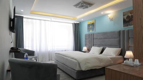 Кровать или кровати в номере Sapphire Hunza