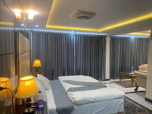 Кровать или кровати в номере Sapphire Hunza