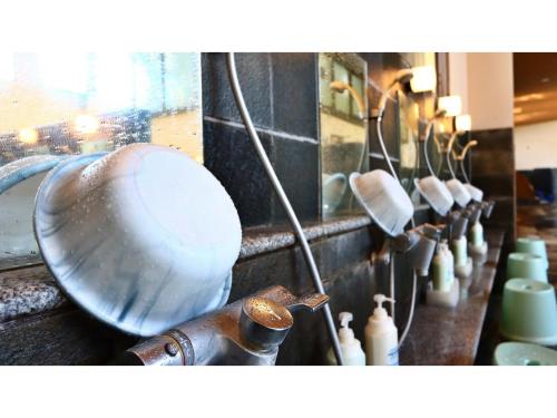 a kitchen counter with a metal bowl and other items at Miki no Sato Hotel Miki - Vacation STAY 52488v in Gero