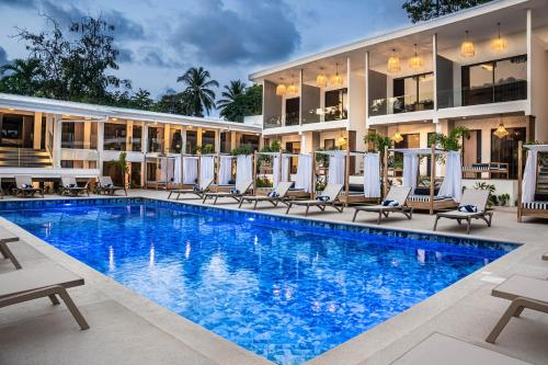 an image of a swimming pool at a hotel at Lia Hotel Jaco in Jacó