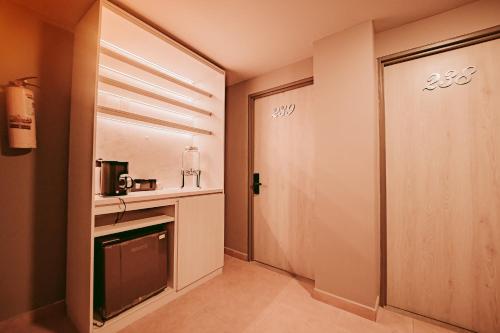Kuchyň nebo kuchyňský kout v ubytování HOTEL VERANO