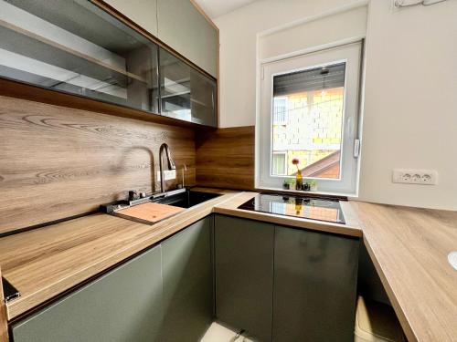 Kuchyň nebo kuchyňský kout v ubytování Ilidza Apartments - PEJTON RESIDENCE - Free Parking