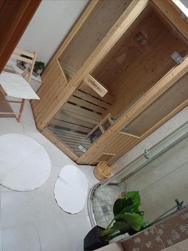an overhead view of a living room with a wooden ceiling at Crystal Aura in Paralia Katerinis