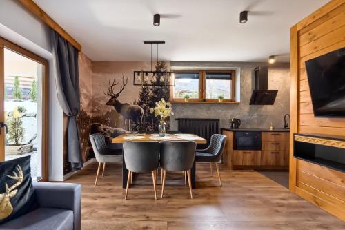 Kuchyňa alebo kuchynka v ubytovaní REZYDENCJA SKIBÓWKI sauna&jacuzzi