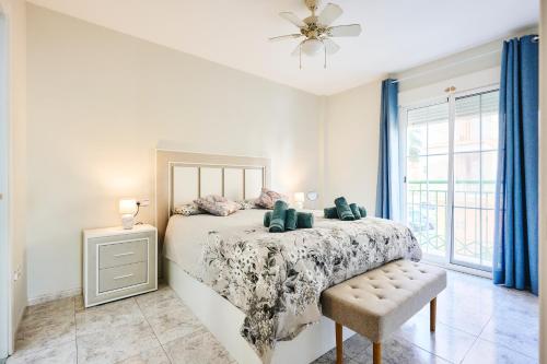 Ένα ή περισσότερα κρεβάτια σε δωμάτιο στο Wild Palms Apartment