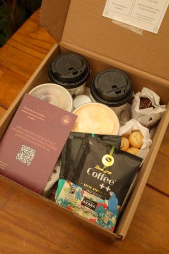 a box filled with different types of food at Chalé com ar condicionado e garagem in Alto Paraíso de Goiás